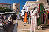 Colourful market in Place de l'Europe, the 15th century Torrione watchtower beyond, Bonifacio, Corse-du-Sud, Corsica, France, Mediterranean, Europe