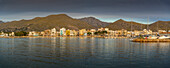 View of sunrise reflecting on hotels and bars in Port de Pollenca, Port de Pollenca, Majorca, Balearic Islands, Spain, Mediterranean, Europe