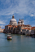 View of the Grand Canal with the Basilica of Santa Maria della Salute in the background, Venice, UNESCO World Heritage Site, Veneto, Italy, Europe