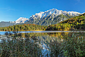 Karwendel mountain range reflecting in Ferchensee Lake, Werdenfelser Land, Upper Bavaria, Germany, Europe