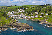 Aerial view of Polperro fishing village and harbour on a sunny spring afternoon, Cornwall, England, United Kingdom, Europe
