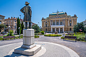 View of Ivan Zajc statue in Theatre Park and Croatian National Theatre, Rijeka, Kvarner Bay, Croatia, Europe