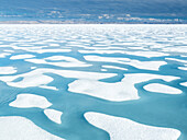 Melt water pools in the 10/10ths pack ice in McClintock Channel, Northwest Passage, Nunavut, Canada, North America