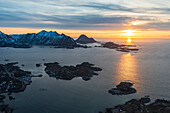 Aereal view of sunrise over mountains and Arctic sea, Leknes, Nordland county, Lofoten Islands, Norway, Scandinavia, Europe