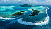Aerial of the lagoon of Maupiti, Society Islands, French Polynesia, South Pacific, Pacific