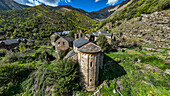 Aerial of the Romanesque church of Santa Maria de Cardet, UNESCO World Heritage Site, Vall de Boi, Catalonia, Spain, Europe