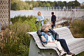 Mature couple relaxing on bench