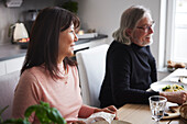 Man and woman eating dinner at home together