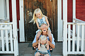 Happy mother with two daughter