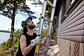 Man holding ladder