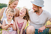 Happy family in meadow