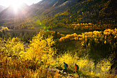 Tourists hiking in mountain scenery