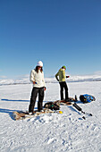 Women preparing for ice fishing