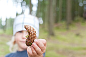 Boy holding cone