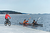 People kayaking and skiing