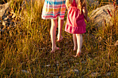 Girls walking on grass