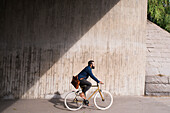 Man cycling on street