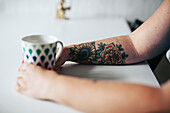 Hands with mug