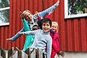 Mother with children playing outdoor