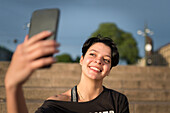 Teenage girl taking selfie