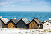 Holzhäuser am Meer