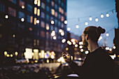 Man taking photo at dusk