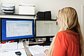 Blond woman working in office