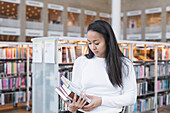 Young woman in library