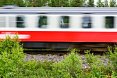 Red train in motion