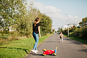 Mother with daugther on bicycle