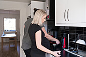 Couple in kitchen