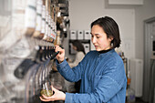 Woman working in organic shop