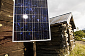 Solar panels on wooden house