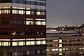 Illuminated buildings at dusk