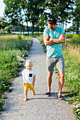 Father with son walking