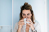 Woman having coffee