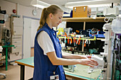 Female engineer checking hospital equipment
