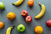 Fruits on grey background