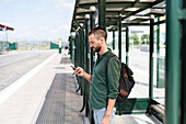 Man waiting on bus stop