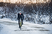 Man cycling at winter