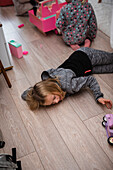 Girl playing on floor