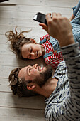 Father and daughter taking selfie