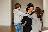 Police woman with children