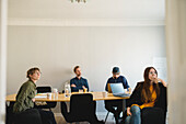 Coworkers in meeting room