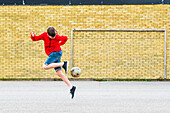 Boy playing soccer