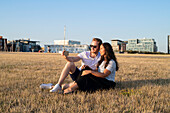 Young couple taking selfie