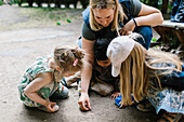 Teacher with children outside