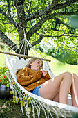 Girl lying on hammock