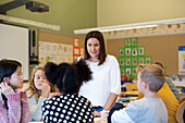 Teacher with children in classroom