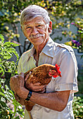 Man holding chicken